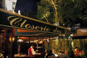 The restaurant "La Closerie des Lilas" in Paris. Terrace by night.